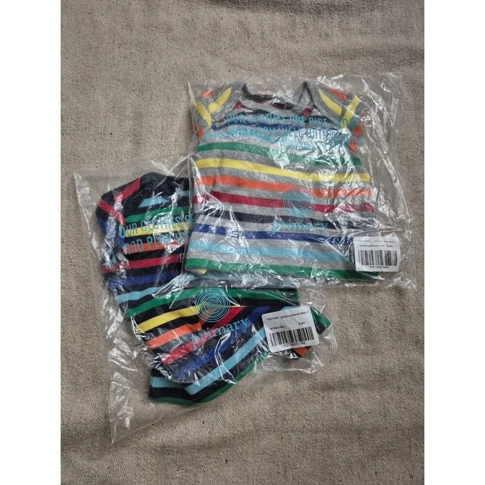 Primary rainbow long sleeve organic bodysuits size 6-9 months